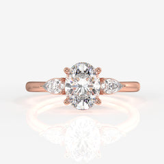 Shop Premium Oval and Pear Cut Moissanite Diamond Three Stone Sterling Silver Ring