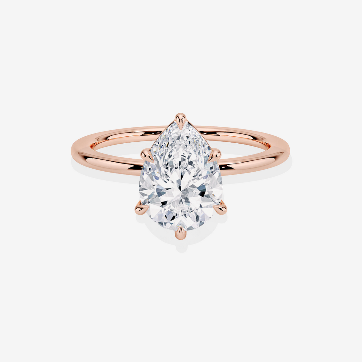 Elaria Sol Pear Cut Moissanite Diamond Petite Solitaire Engagement Sterling Silver Ring