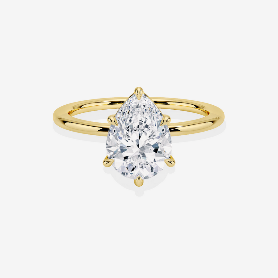 Pear Cut Moissanite Diamond Petite Solitaire Engagement Sterling Silver Ring product photo | Caratbazaar
