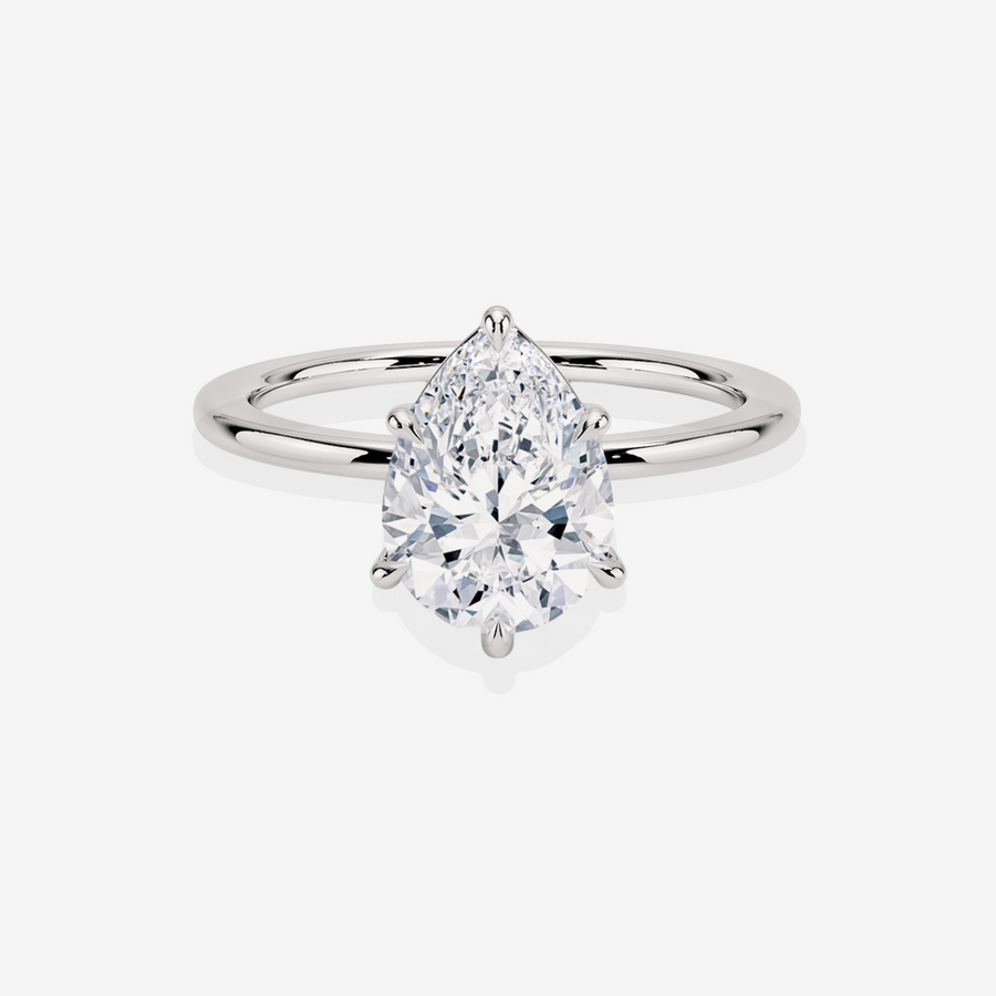 Elaria Sol Pear Cut Moissanite Diamond Petite Solitaire Engagement Sterling Silver Ring