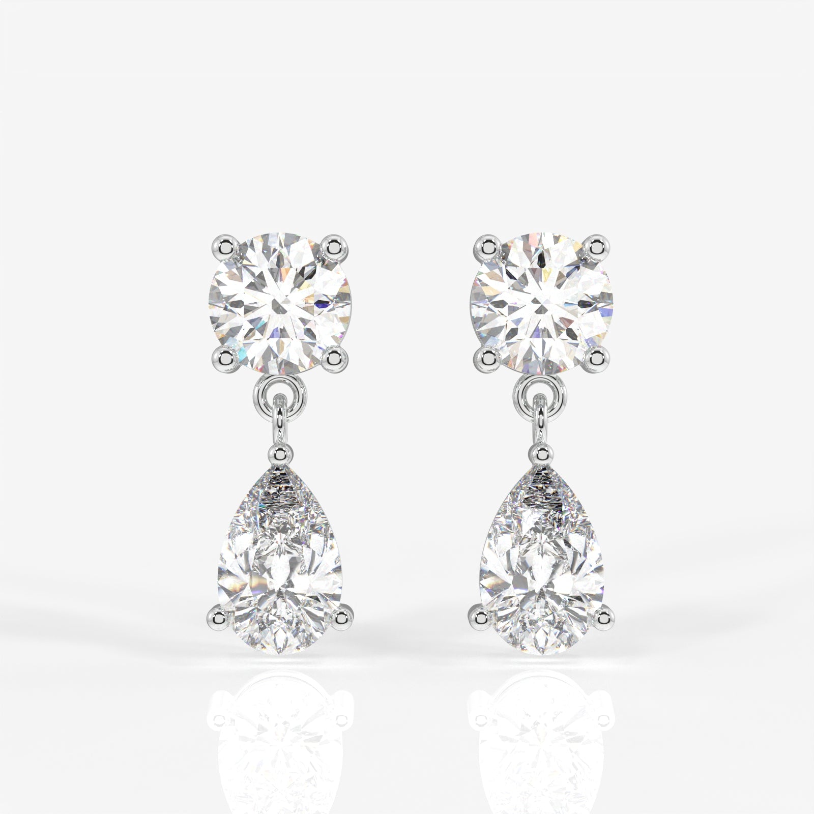 Round and Pear Cut Moissanite Diamond Dangle Sterling Silver Earrings