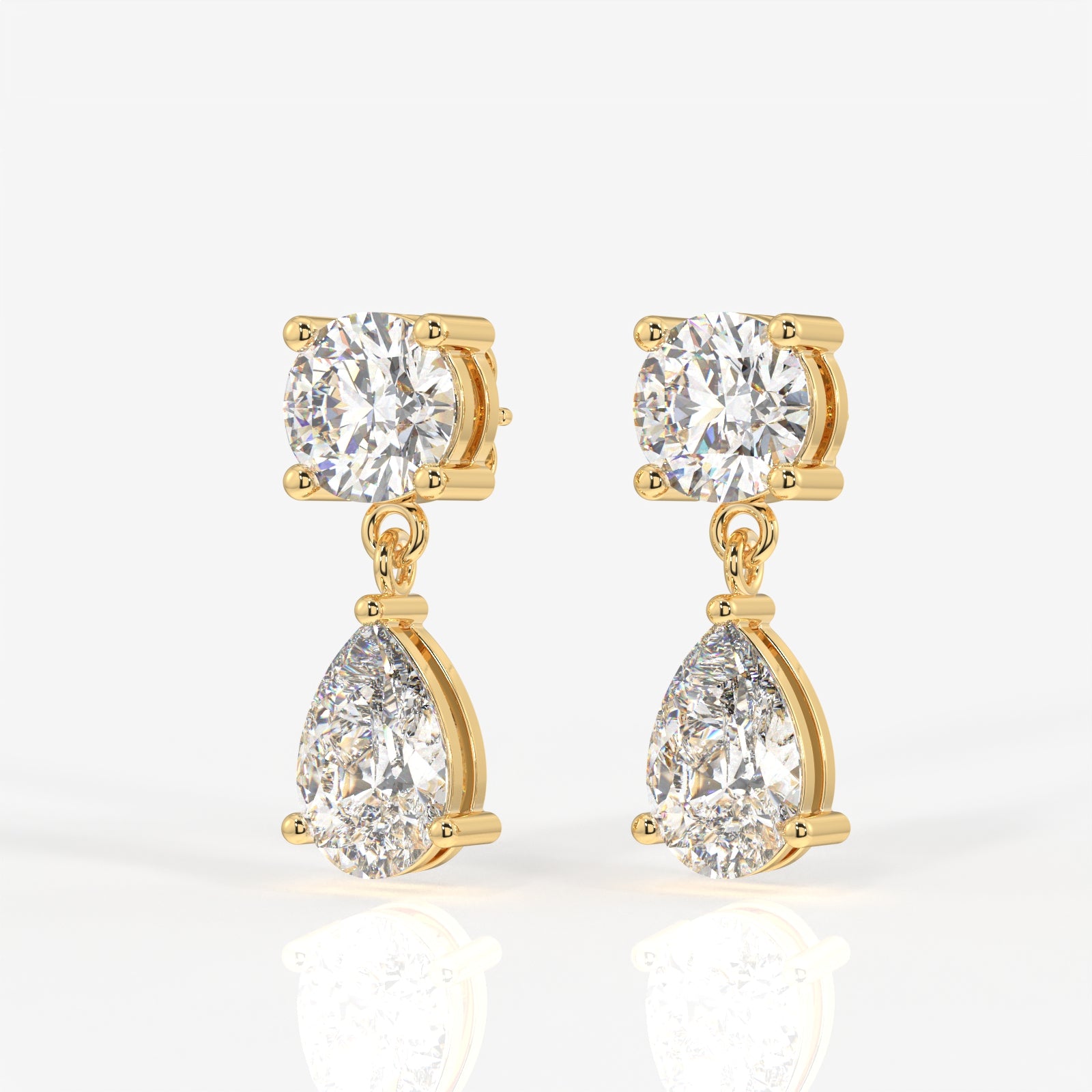 Round and Pear Cut Moissanite Diamond Dangle Sterling Silver Earrings