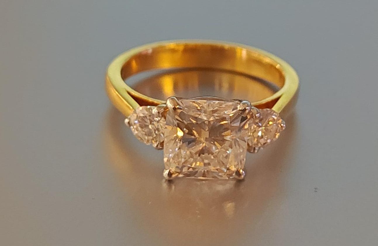 Cushion and Round Cut Lab Grown Diamond Trilogy 18K Gold Ring