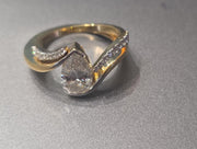 Pear cut lab grown diamond ring with band 14k gold