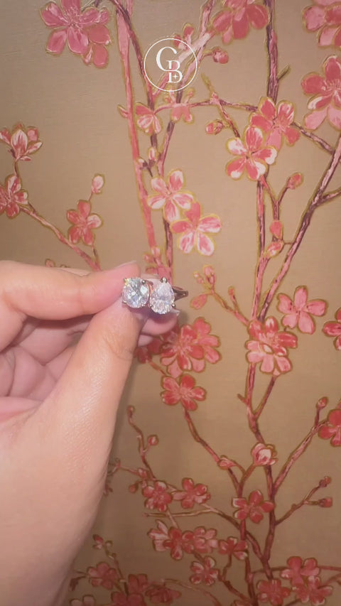 Round and Pear Cut Moissanite Diamond Toi - Et - Moi Sterling Silver Ring